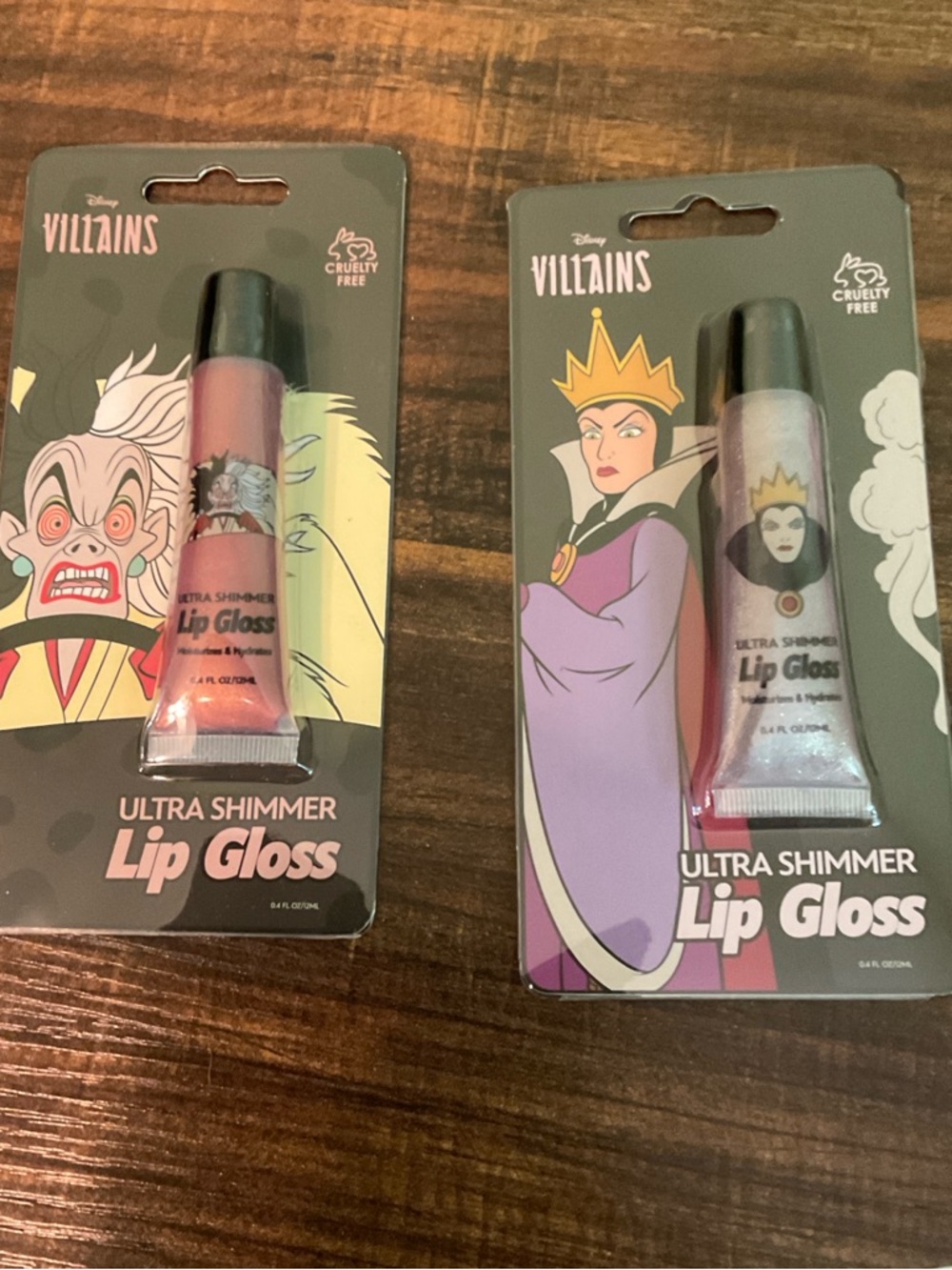 Disney Villain Ultra Shimmer  Lip Gloss New 2 Pack. 
0.4 oz